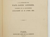 an open book with a green border on the front of it