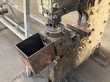 a machine that is sitting on the side of the road