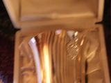 a silver object in a box on the floor