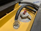 a close up of a hose connected to a gas hydrant
