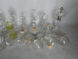 a lot of glass bottles with corks on them