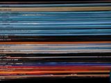 a lot of dvds stacked on top of each other