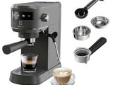 an image of a coffee machine with a cup of coffee next to it