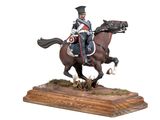statue of a man riding on a horse with a sword