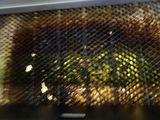 a close up of a grill with a lot of food inside of it
