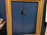 a picture of a picture frame sitting on the floor
