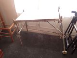 a small table with a bike on it in a room