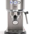 a coffee machine that is sitting on a white surface