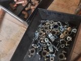 two trays of nuts and a pair of scissors on a table