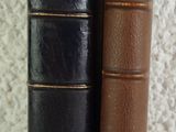 two books that are sitting on a table together