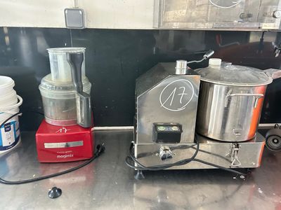 a blender and a blender sitting on a counter