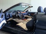 a picture of the interior of a car with the door open
