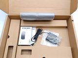 a box that has a mouse in it and a charger in it