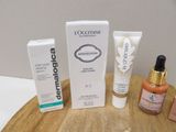 three different types of skin care products sitting on a table