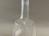 a glass decanter with a glass stopper on it