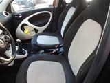 a picture of a small car with black and white seats