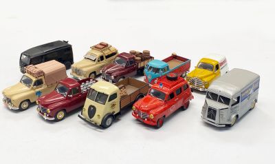 many toy cars that are lined up together on the table