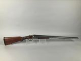 a rifle with a wooden barrel and a wooden muzzle