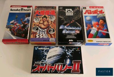 un grand nombre de jeux vidéo posés sur une table