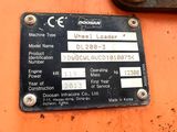 a close up of a metal plate on a machine