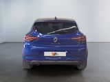 the rear end of a blue car in a showroom