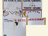many signs that are on the side of a building