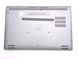 a laptop that is sitting on a white surface