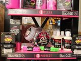 a shelf with a lot of beauty products on it