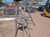 an image of a ladder with a chair on it