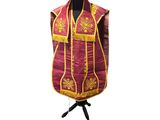 an image of a vest with a gold and red design on it