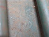 a close up of a metal pipe with rust on it