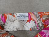 a tie with a design on it on a table