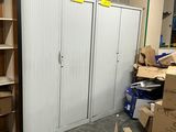 a room with a bunch of boxes and boxes on the floor