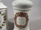two ceramic containers that are sitting next to each other