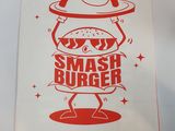 a sign that says smash burger flat but fat strong in flavor