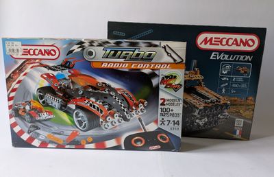 two boxed legos that are sitting on a table