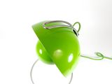 a green lamp that is on top of a wire