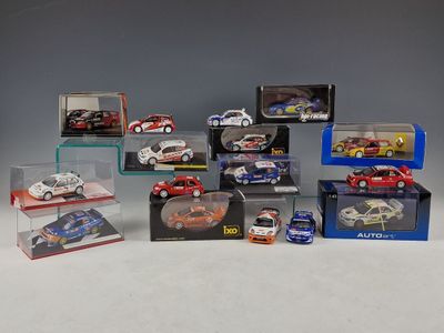 many different models of cars in a display case