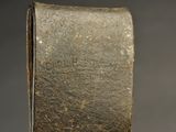 a close up of a piece of metal on a table