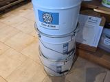 a stack of buckets stacked on top of each other in a store