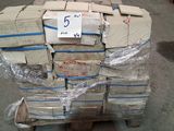 a large pile of boxes on a pallet in a warehouse