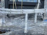 a truck that has a lot of plastic wrapped around it