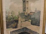 aquarelle encadrée représentant un château avec un pont au premier plan