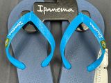 a pair of blue flip flop flop flop flop flop flop flop flop flop flop flop flop flop flop flop flop
