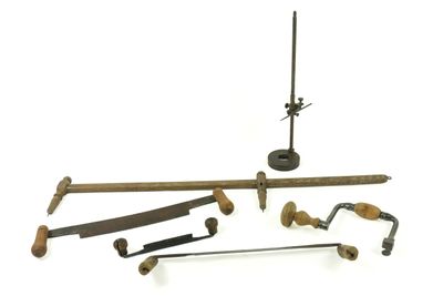 a lot of tools that are sitting on a white surface