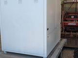 a white refrigerator sitting on top of a trailer