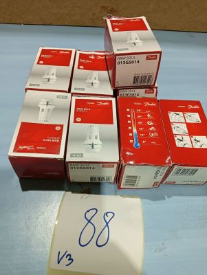 several boxes of red and white electronic devices on a blue surface