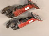 pair of antique cast iron fire extinguisors