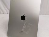 the back of an apple ipad with a sticker on the side of it