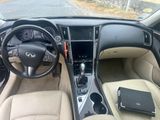 a picture of a car dashboard with a laptop in it